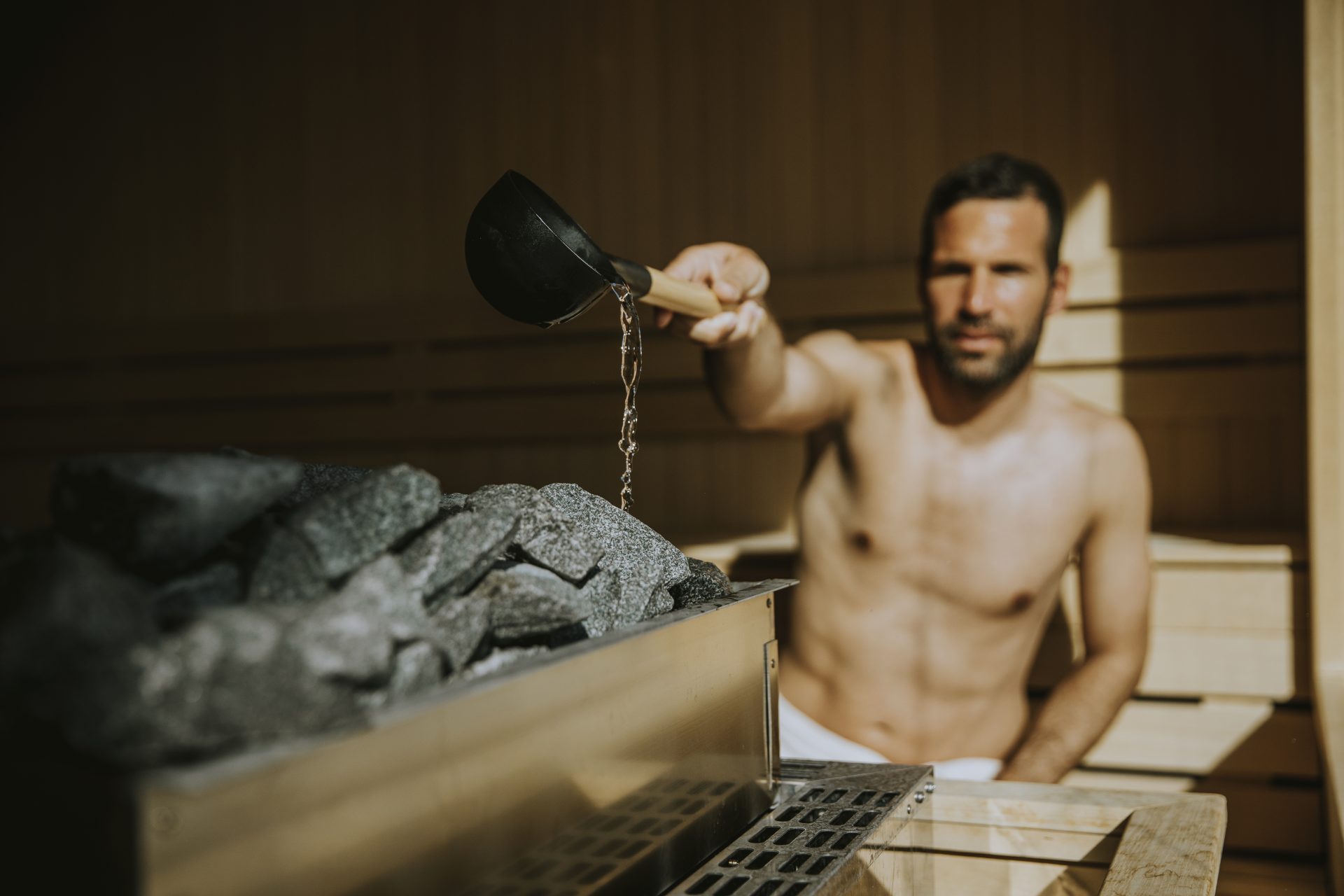 man in the sauna after workout